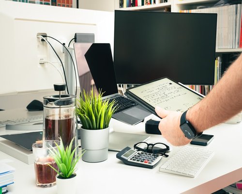 water bottle on office table near computer